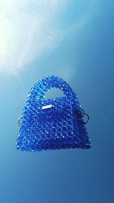 Handmade bag knitted with crystal beads and fishing line. Easily fits iPhone, phone and small wallet inside. Depth of the product: 7 height: 12 width: 18 Crystal Bead Bag, Bead Purse, Accessory Inspo, Bead Bag, Frutiger Aero, Woman Bag, Crystal Bags, Beaded Bag, Inspo Board