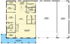 the floor plan for a two story house with an attached garage and living room area