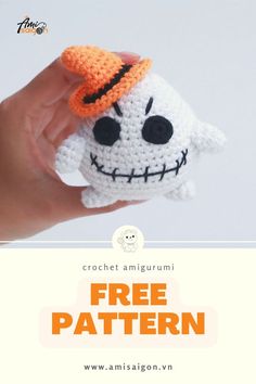 a crochet amigurmi skeleton with a hat on it's head