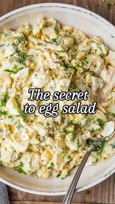 an egg salad in a white bowl with the words, the secret to egg salad