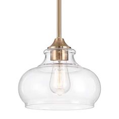 Kira home's Harlow 9 in. pendant boasts stylish cool brass finish and a clear glass shade. Though vintage and antique in style, the clean and classic design works well in a variety of environments such as contemporary rustic, industrial, farmhouse / barn house, schoolhouse, and retro. To further evoke a mood of nostalgia, capitalize on the beautiful clear glass shade by pairing it with Edison vintage style bulb, allowing the warm glow and detailed filaments to shine through. A telltale sign of g Rustic Industrial Farmhouse, Slanted Ceiling, Farmhouse Pendant Lighting, Contemporary Pendant Lights, Rustic Contemporary, Industrial Farmhouse, Curved Glass, Retro Designs, Modern Pendant Light