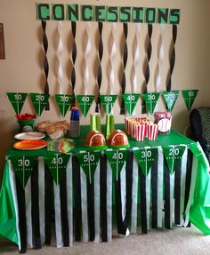 a football themed party with green and black decorations