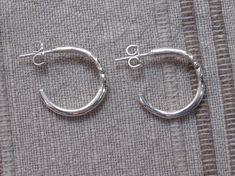 ER664 - Sterling Silver Handmade One of a Kind Post Hoop Earrings. Nice Casual everyday earrings and would make a great gift. Earrings measure: 2 mm Wide x 18mm Outside Diameter These earrings are made using the Lost Wax Casting Process where I make the design in wax and then cast it into Silver. To learn more about the Lost Wax process and me please visit my website at: www.denimanddiamondjewelry.com Modern Handmade Hoop Earrings For Anniversary, Handmade Modern Hoop Earrings For Anniversary, Swiss Blue Topaz Ring, Artisan Earrings, Wax Casting, Casting Jewelry, Original Jewelry, Lost Wax, Everyday Earrings