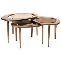 three tables with different shapes and sizes on them