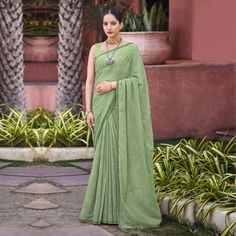 Pista Green colored saree is made from chiffon fabric which is highlighted with beautiful foil printed & swarovski work as shown. Comes along with unstitched banglori blouse piece which you can customise as per your design/style. Occasion - You can wear this saree for festive, functions and fashionista. Note:- the actual product may differ slightly in color and design from the one illustrated in the images when compared with computer or mobile screen. Measurements: Saree : Chiffon : 5.5 Mtrs Blouse : Chiffon : 0.8 Mtr Material: Chiffon Stitch Type: Unstitched Country of Origin: India Care Guide: Dry Clean Pista Green Pre-draped Georgette Saree With Mirror Work, Embellished Pista Green Pre-draped Saree In Georgette, Embellished Pista Green Georgette Pre-draped Saree, Pista Green Semi-stitched Georgette Saree, Pista Green Embroidered Semi-stitched Saree Fabric, Chiffon Saree, Foil Print, Blouse Piece, Chiffon Fabric