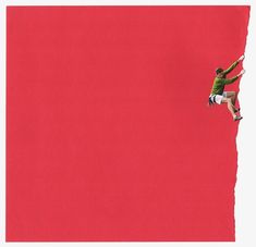 a skateboarder is doing a trick on a red wall with his arms in the air