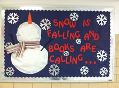 snow is falling and books are calling on the bulletin board in the school's classroom