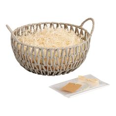 a basket with rice in it next to a packet of cheese