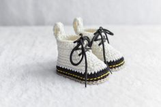 These cream color crochet baby booties make a great baby shower gift or can be used for a gender reveal! Have a sneakerhead friend who is expecting a baby, these Drmartens crochet newborn baby booties will surprising them. Cleaning instructions: Please hand wash at 30 degrees with soap. It can be lightly squeezed by hand without twist it. Don't leave it wet for a long time after washing. No ironing. Don't wash in the washing machine. Baby Doc Martens, Crochet Newborn, Cadeau Baby Shower, Expecting A Baby, Newborn Crochet, Crochet Baby Booties, Expecting Baby, Gift Newborn, Don't Leave