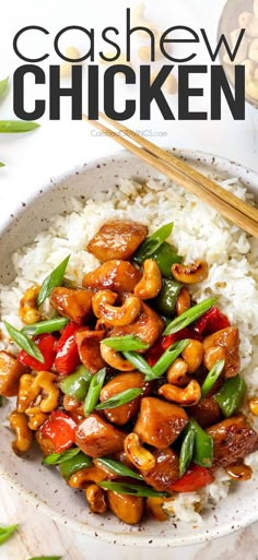 cashew chicken served over rice in a bowl with chopsticks on the side