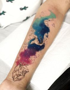 a person with a tattoo on their arm