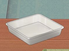 a white container sitting on top of a wooden table