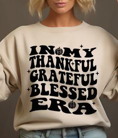 Grateful Thankful Blessed shirt, Eras shirt, Fall Vibes, Thankful Grateful Blessed, In my Thankful Era sweatshirt, Cute Thanksgiving shirt Additional images/shirts available here: https://www.etsy.com/shop/TXCraftyCouple Our shirts are made with high quality vinyl and pressed via a professional heat press. The printing process will allow you to wash and wear many times! These are unisex shirts- in my opinion they run like a normal t-shirt would run. For a looser fit, please order a size up. These shirts are super soft and comfy- you will find yourself wearing them every chance you can get!  This is a Bella + Canvas (soft feel) shirt 100% airlume combed and ringspun cotton Side seams, retail fit Shoulder to shoulder taping Tearaway label Thankful Grateful Blessed Shirt, Blessed Shirt, Thankful Grateful Blessed, Thankful And Blessed, Thanksgiving Shirt, Thanksgiving Shirts, Holiday Shirts, Unisex Shirts, Fall Vibes