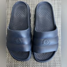 New Men's "Moncler" Navy Lolo Sandal, Size: Us-9, Eu-42, Signature Moncler Logo On The Front Of Each Sandal, Moncler Dust Bag, Signature Moncler Box. Luxury Blue Slides For Summer, Luxury Blue Summer Slides, Designer Blue Slides With Branded Insole, Designer Blue Slides For Summer, Gucci Slipper, Navy Sandals, Moncler Logo, Mens Slides, Slides Sandals