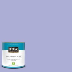 the behr paint is light blue and has a green base with white lettering on it