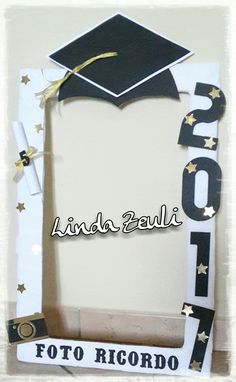 a photo frame made out of paper with a graduation cap and stars on the front