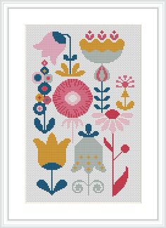 a cross stitch pattern with flowers and birds on it's side, in white frame