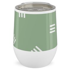 a green and white tumbler cup on a white background