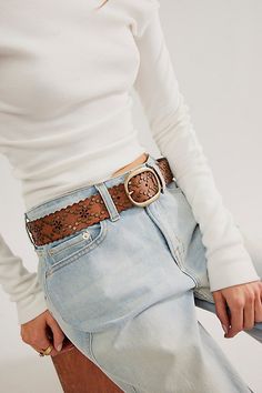 Add a studded touch to every outfit with this effortlessly cool belt, featured in a soft leather fabrication with laser-cut floral detailing and classic buckle closure. **Features:** Soft leather with metal studs, laser-cut detailing, metal buckle with prong closure **Why We ❤ It:** Made to be worn with every outfit, this belt is forever-timeless. | Modern Meadow Stud Belt by Free People in Brown, Size: M/L Free People Belt, Belts Outfits, Black Belt Outfit, Concert Outfit Fall, Stud Belt, Cool Belt, Lace Belt, Rockstar Aesthetic, Free People Accessories