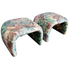 two stools made out of fabric with flowers on them