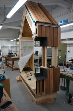 an office with several wooden structures in it