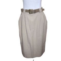 Vintage Belted Pencil Skirt With Pockets Womens Size 10 Khaki  Brand: Joan Walters Size 10 75% polyester 25% rayon Measurements: Waist: laying flat 15" Hips 21" Length 26" Pre-owned No defects noted Features: * Vintage pencil skirt * Spring, Summer, Winter, Fall Size: Womens 10 Condition: Pre-Owned Like New Beige High Waist Pencil Skirt For Work, High Waist Beige Pencil Skirt For Work, Classic Summer Pencil Skirt For Office, Classic Summer Workwear Pencil Skirt, Beige Pencil Skirt For Summer Workwear, Beige Pencil Skirt For Office In Spring, Beige Pencil Skirt For Summer Office Wear, Summer Office Beige Pencil Skirt, Retro Pencil Skirt For Workwear