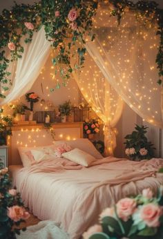 a bed covered in lots of lights next to flowers and greenery on the wall