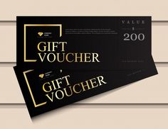 two black and gold gift voucher cards