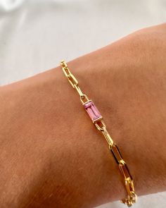 Natura Sapphire 14K Solid Gold Bracelet Baguette Cut  PaperClip Chain, Diamond Bracelet, Blue Sapphire, Pink Sapphire, Bracelet Stack A modern minimalist design, set with a natural pink sapphire baguette in a open bezel setting that is part of the chain and is connected in the middle.  Bracelet description: * Bracelet length: 7.09" / 18 cm.  * Chain: Paper clip  0.09"/ 0.023 cm wide. * Materiel: 14K Yellow Gold Stones: option 1: ------------ * Stone: Natural diamond * Carat weight: approx. 0.22 Gold Arm Band, Gem Tones, Chain Diamond, Solid Gold Bracelet, Gold Armband, Cvd Diamond, Bracelet Blue, Sapphire Bracelet, Diamond Carat