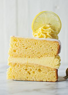 a slice of cake with lemon on top