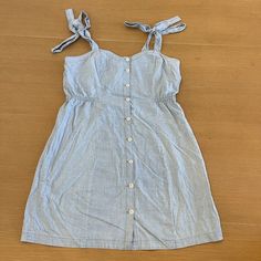 Women's Madewell Denim Tie-Strap Button-Front Sundress Size 12 Blue Morley Wash Lightweight Denim Button-Front Adjustable Tie Straps Waisted Cotton New With Tags Please See Pictures For Measurements Summer Cotton Denim Dress With Adjustable Straps, Cotton Denim Dress With Button Closure For Day Out, Light Blue Casual Dress With Adjustable Straps, Casual Light Blue Dress With Adjustable Straps, Summer Denim Dress For Daywear With Button Closure, Summer Denim Dress With Button Closure For Daywear, Summer Denim Dress With Pockets, Casual Denim Dress With Adjustable Straps, Casual Chambray Dresses With Buttons