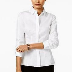 White Wrinkle-Free Button-Up - Women. A Professional Silhouette, Pair-Easy Color And Wrinkle-Free Fabric Deem This Piece Fit For The Modern Globe Trotter. Size M: 26 Long From High Point Of Shoulder To Hem Wrinkle-Free Front Button Closure 100% Point Collar Covered Button-Front Closures Cuffed Long Sleeves Hits At Hip Polyester Dry Clean Imported Due To Variances In Monitor Color, And Lighting, The Color Of Some Items May Differ Slightly From The Photographs Tommy Hilfiger Spring Workwear Shirt, Tommy Hilfiger Long Sleeve Blouse, Tommy Hilfiger Blouse For Spring Workwear, Tommy Hilfiger Spring Blouse For Work, Tommy Hilfiger Spring Workwear Blouse, Fitted Tommy Hilfiger Shirt For Workwear, Elegant White Tommy Hilfiger Tops, Tommy Hilfiger Button-up Workwear Tops, Fitted Classic Tommy Hilfiger Shirt