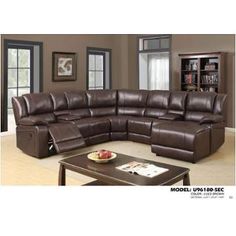 a large sectional sofa with recliners in a living room