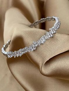 TIFANY SILVER Baguette Cubic Crystal Cuff is created in a unique style with high quality zirconia crystals to catch all eyes on you. They will freely catch the light for the sparkle and create a luxe look. Perfect to stack with other Saint Luca designs.WHY IT IS SPECIAL- High-quality plating that gives our pieces its beautiful, subtle hue- Made in hypoallergenic metal so your skin is safe- Nickel-free, lead-free, safe product bring you better wearing experience- Perfect for any occasion in your Silver Bracelet Cuff, Marilyn Monroe Fashion, Silver Bangle Bracelet, Bracelet Dainty, Dainty Bracelet, Bracelet Cuff, Dainty Bracelets, Silver Bangle Bracelets, Micro Macrame