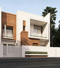 an apartment building with balconies on the second floor