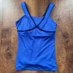 New With Tags Womens Tennis Tank Top Size Small Drifit Built In Bra Mesh Panels Blue With White Swoosh Polyester/Spandex Material Measurements Are Approximate: 14 1/2” Pit To Pit Laying Flat 23”L Shoulder To Bottom Of Hem Pet & Smoke Free Home Blue Tank Top With Built-in Bra For Yoga, Blue V-neck Athleisure Top, Blue V-neck Tank Top With Built-in Bra, Blue Stretch Tank Top For Gym, Blue Stretch Sporty Tank Top, Blue Sporty Stretch Tank Top, Blue Yoga Tank Top With Built-in Bra, Spring Blue Activewear With Built-in Bra, Light Blue Fitted Workout Tank Top