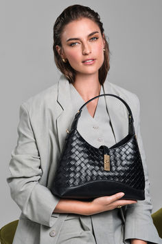 Crafted from premium leather, our woven Dorset shoulder bag is a versatile everyday companion. This versatile style can be carried by the top handle or worn cross-body using the detachable soft leather strap. Inside, there's ample room for all your belongings with a central zipped compartment, complete with a zipped side pocket.