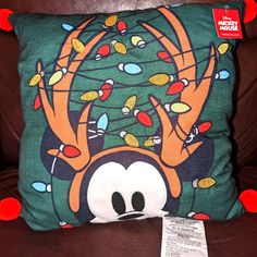 a pillow with an image of mickey mouse on it and the words poshmark