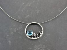 "Gorgeous blue topaz and sterling silver pendant on a sterling silver cable.  Approximatley 1.5\" diameter with a 8mm cabochon." Bubble Earrings, Silver Jewelry Diy, Fine Silver Jewelry, Silver Jewelry Earrings, Silver Jewelry Design, Silver Jewels, Silver Jewelry Rings, Silver Jewelry Handmade, 925 Silver Jewelry