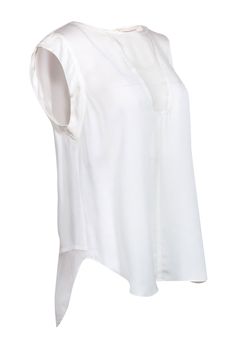 Add a touch of elegance to your office wardrobe with our Rebecca Taylor ivory silk cap sleeve blouse. This versatile piece is crafted with high-quality silk and features cap sleeves, making it a perfect choice for layering under a cardigan or statement blazer. Elevate your professional style with ease! Size 12 100% Silk Keyhole button-back detail Sheer V-neck front Cap shoulder detail Bust 42" Waist 42" Shoulder to hem 27" Statement Blazer, Office Wardrobe, Cap Sleeves Blouse, Professional Style, Ivory Silk, Professional Fashion, Rebecca Taylor, Cap Sleeve, Cap Sleeves