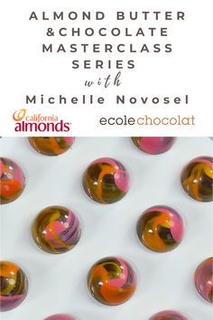 an advertisement for chocolates with pink and orange swirls on it, in front of a white background