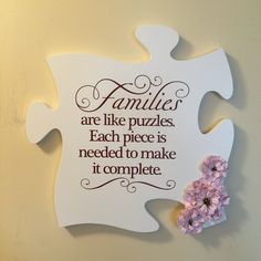 a piece of puzzle with the words families are like puzzles each piece is needed to make it complete