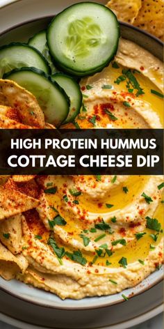 hummus and cucumber on a plate with the title high protein hummus cottage cheese dip