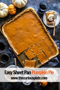 pumpkin pie on a table surrounded by plates and forks, with the crust cut into squares