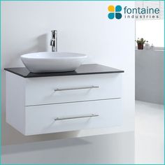 a white sink sitting on top of a counter next to a bowl under a faucet