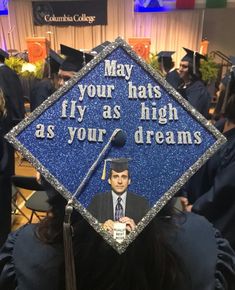 a blue graduation cap with the words may your hats fly as high as your dreams