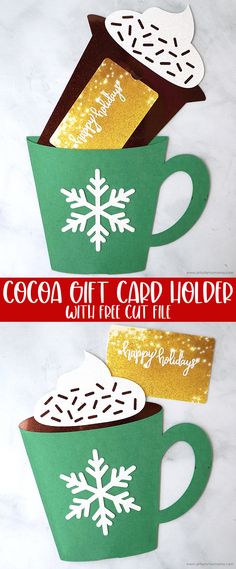 three coffee cups decorated with gold and white snowflakes, one has a gift card in it