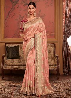 Peach Dola Silk Wedding Wear Embroidery Work Saree MAHARANI 184 Desc: Description Peach Pure Soft Dola silk saree with zari woven and fancy lace border work .The blouse comes as unstitched with embroidery work. Browse our stunning collection of festive wear and wedding silk sarees at KollybollyethnicS and enjoy complimentary worldwide shipping. Theres no need for a minimum order or coupon code. Elevate your festive spirit with our exquisite silk sarees this season. This Diwali weve introd... Peach Saree, Indian Designer Sarees, Green Embroidery, Designer Sarees Online, Party Kleidung, Embroidery Saree, Trendy Sarees, Work Sarees, Lace Border