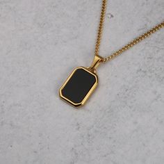 Gold Onyx Pendant Chain Necklace FREE & Fast Shipping! *Premium Stainless Steel *18K Gold Plated *Pendant Length is 22 Millimeters *Polished Onyx Gemstone *Available with 20 Inch or 22 Inch Length Micro Chain *We Recommend 1mm or 2mm Width Chains to Fit Pendant *Will not tarnish, fade, or discolor *Safe in Water *Pendant is removable *Also available in Silver **Check out the rest of our Pendants Collection here --> https://www.etsy.com/shop/famedgoodsnyc?section_id=35454751 Shipping Time -Allow Black Pendant Chain Necklace, Tarnish Resistant, Black Tarnish Resistant Pendant Chain Necklace, Black Tarnish Resistant Pendant Necklace, Black Tarnish-resistant Pendant Chain Necklace, Black Rectangular Chain Necklace With Adjustable Chain, Black Rectangular Chain Necklace, Mens Gold Pendant, Onyx Pendant, Onyx Gemstone