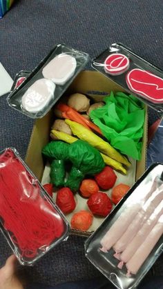 several different types of vegetables in plastic containers